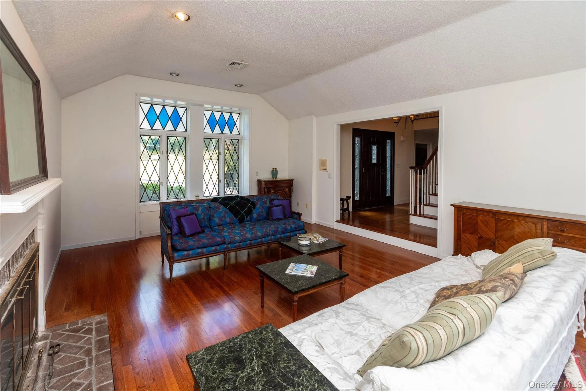 Living room set up as formal space with fireplace Living room set up as formal space with fireplace