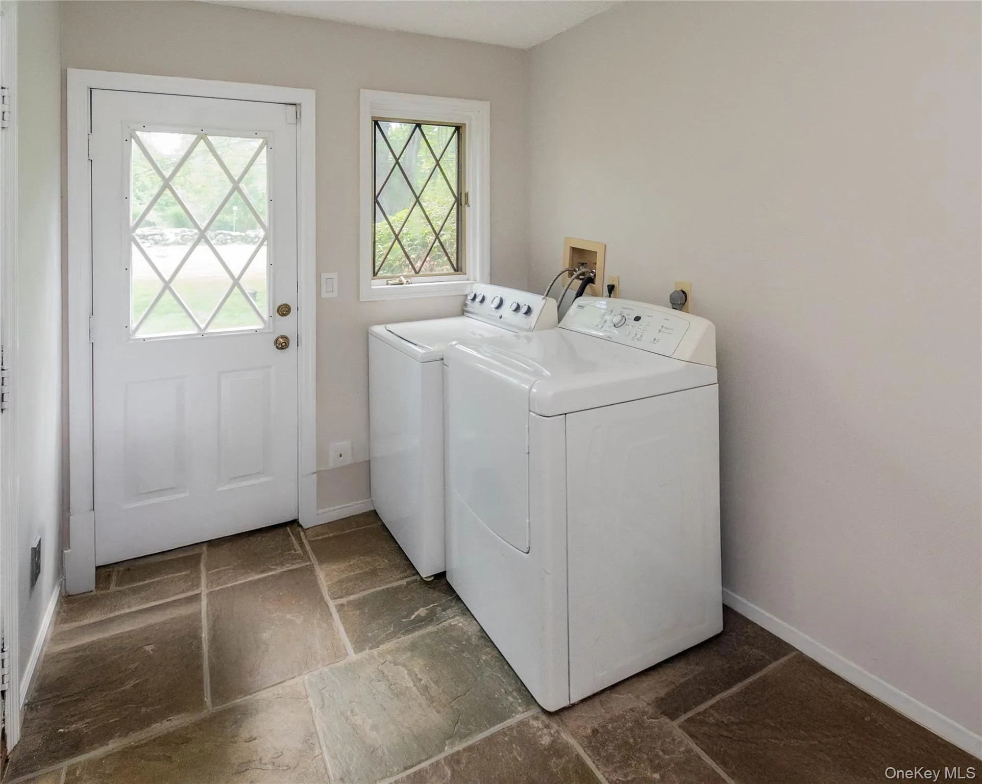 Laundry mud room located off kitchen and leads to garage Laundry mud room located off kitchen and leads to garage