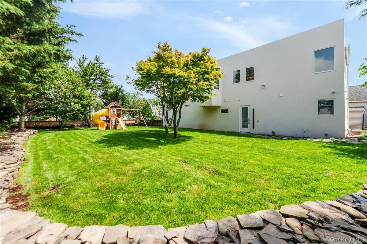 View of yard with a playground View of yard with a playground