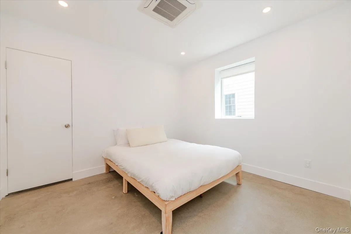 Bedroom featuring recessed lighting Bedroom featuring recessed lighting