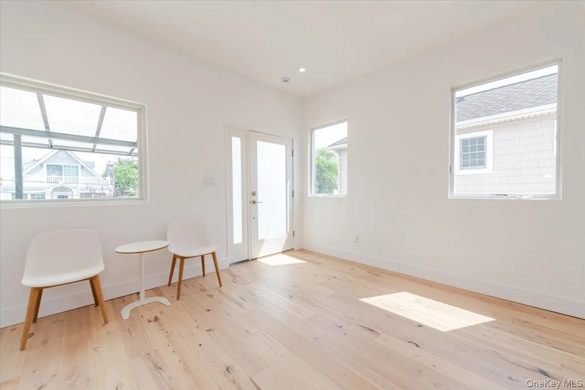 Unfurnished room featuring light wood-style flooring and recessed lighting Unfurnished room featuring light wood-style flooring and recessed lighting