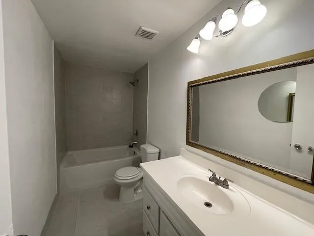 Full bathroom with vanity and washtub / shower combination Full bathroom with vanity and washtub / shower combination