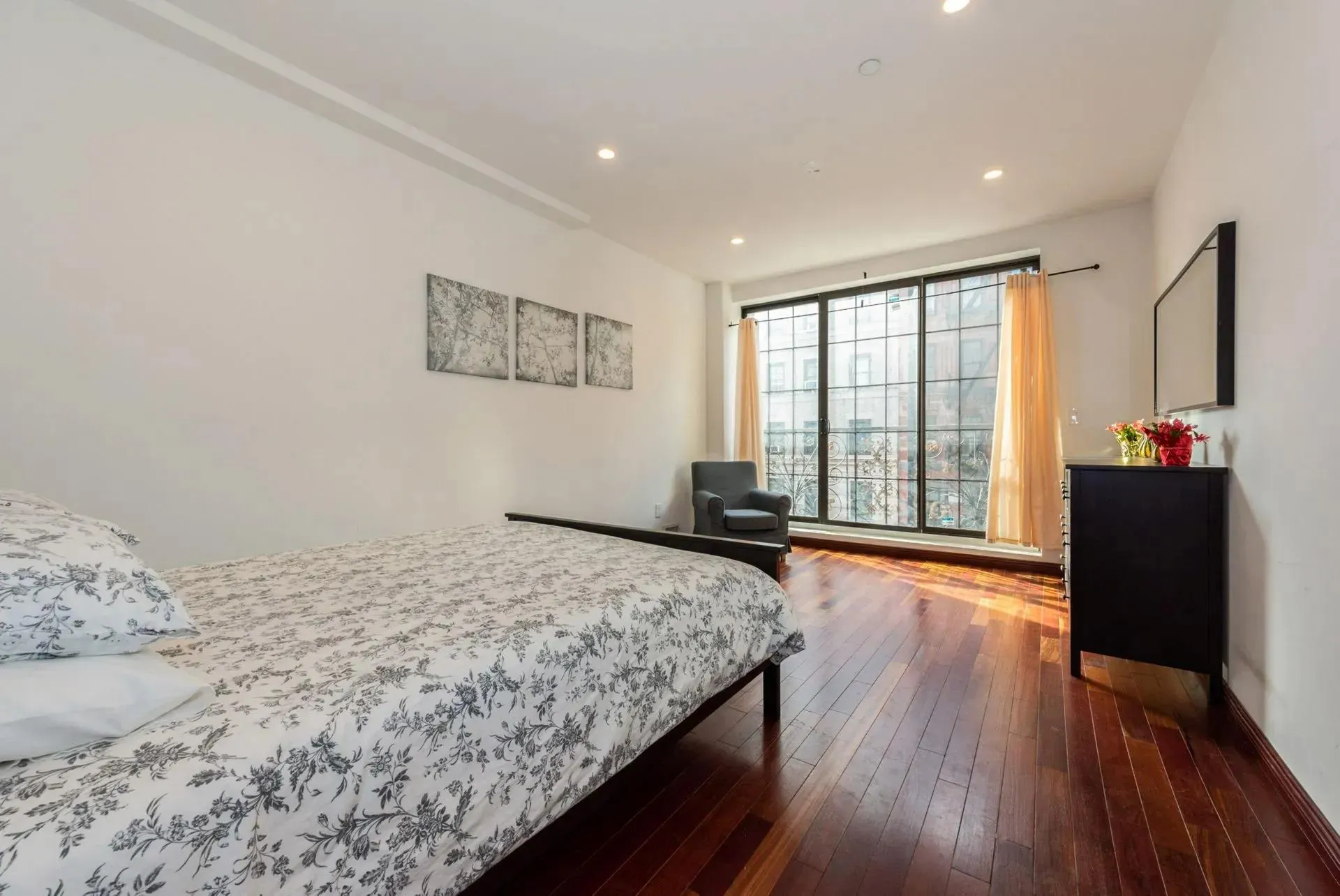 Bedroom featuring dark wood-style floors and recessed lighting Bedroom featuring dark wood-style floors and recessed lighting