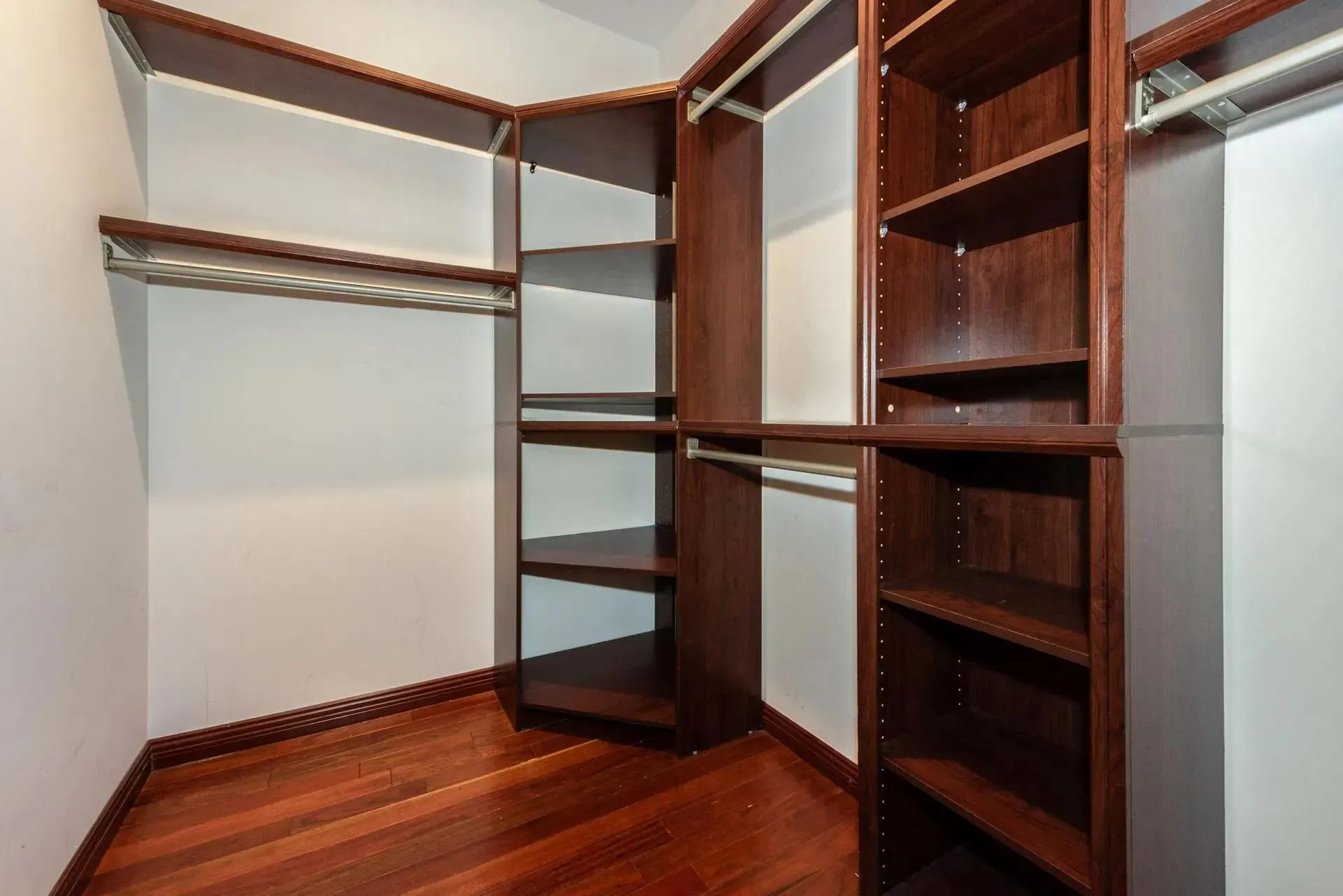 Spacious closet featuring wood finished floors Spacious closet featuring wood finished floors