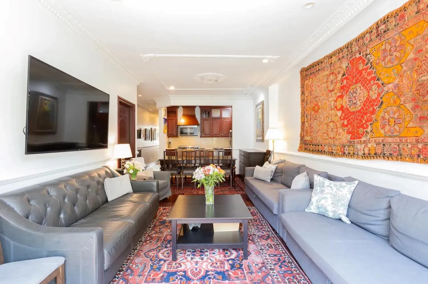 Living room featuring ornamental molding Living room featuring ornamental molding