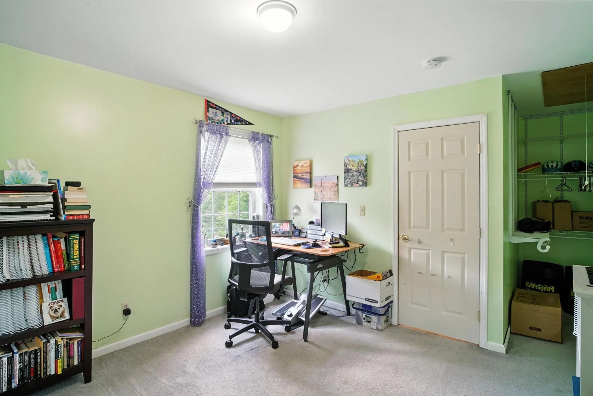 Currently set up for an Office area featuring carpet and attic access Currently set up for an Office area featuring carpet and attic access
