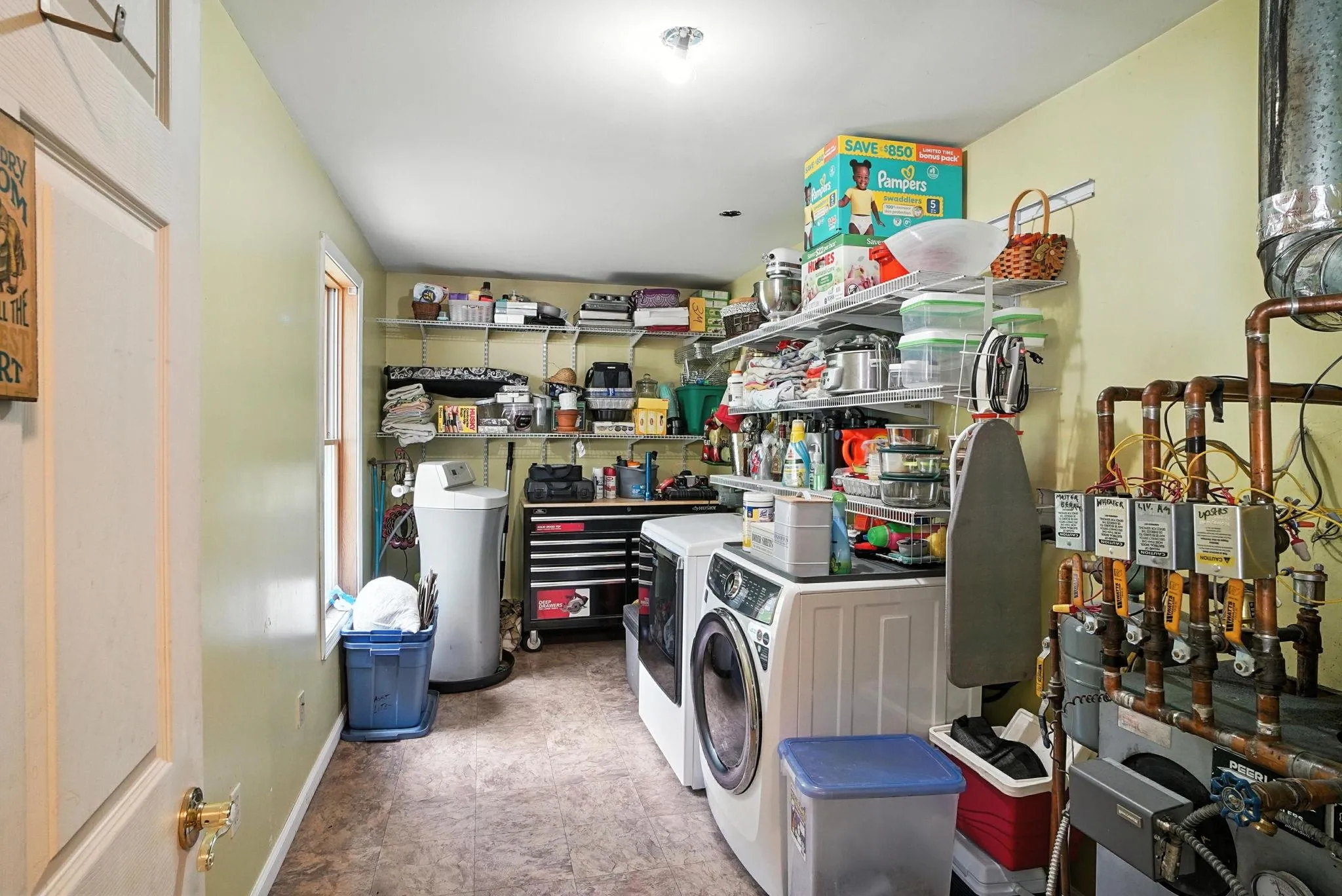 Laundry room and storage area Laundry room and storage area