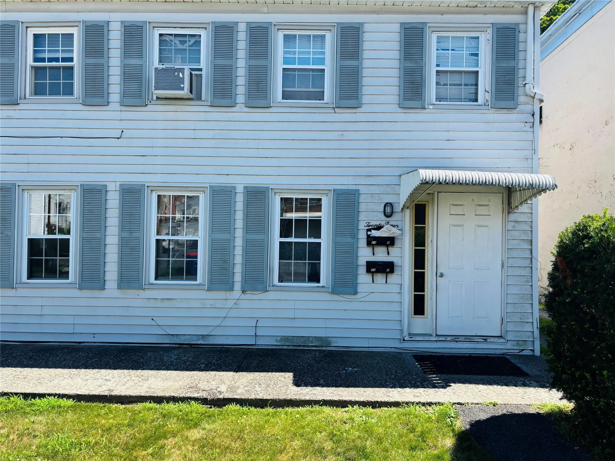 View of front of property featuring cooling unit View of front of property featuring cooling unit