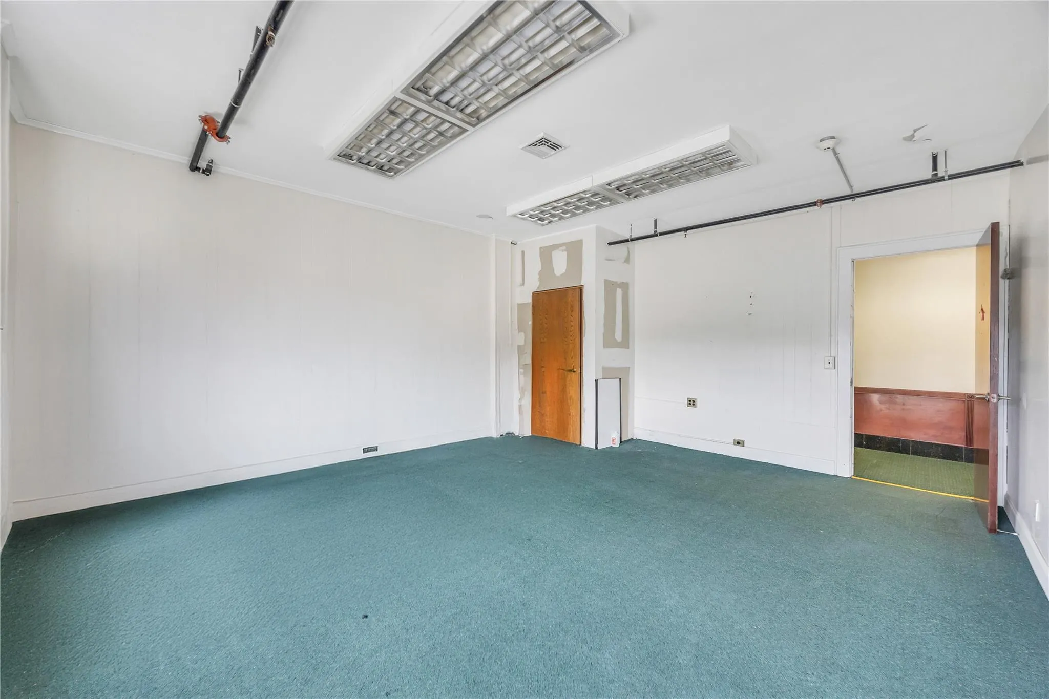 View of carpeted spare room View of carpeted spare room