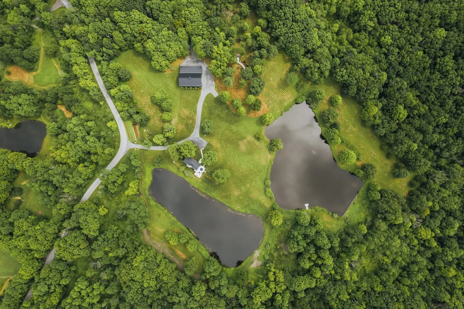 Aerial view of property\'s location featuring a large body of water Aerial view of property\'s location featuring a large body of water