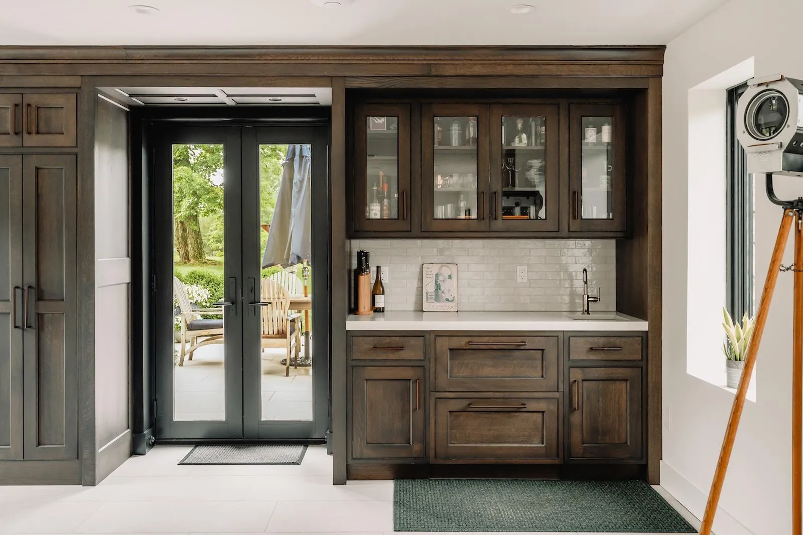 Bar with french doors and decorative backsplash Bar with french doors and decorative backsplash