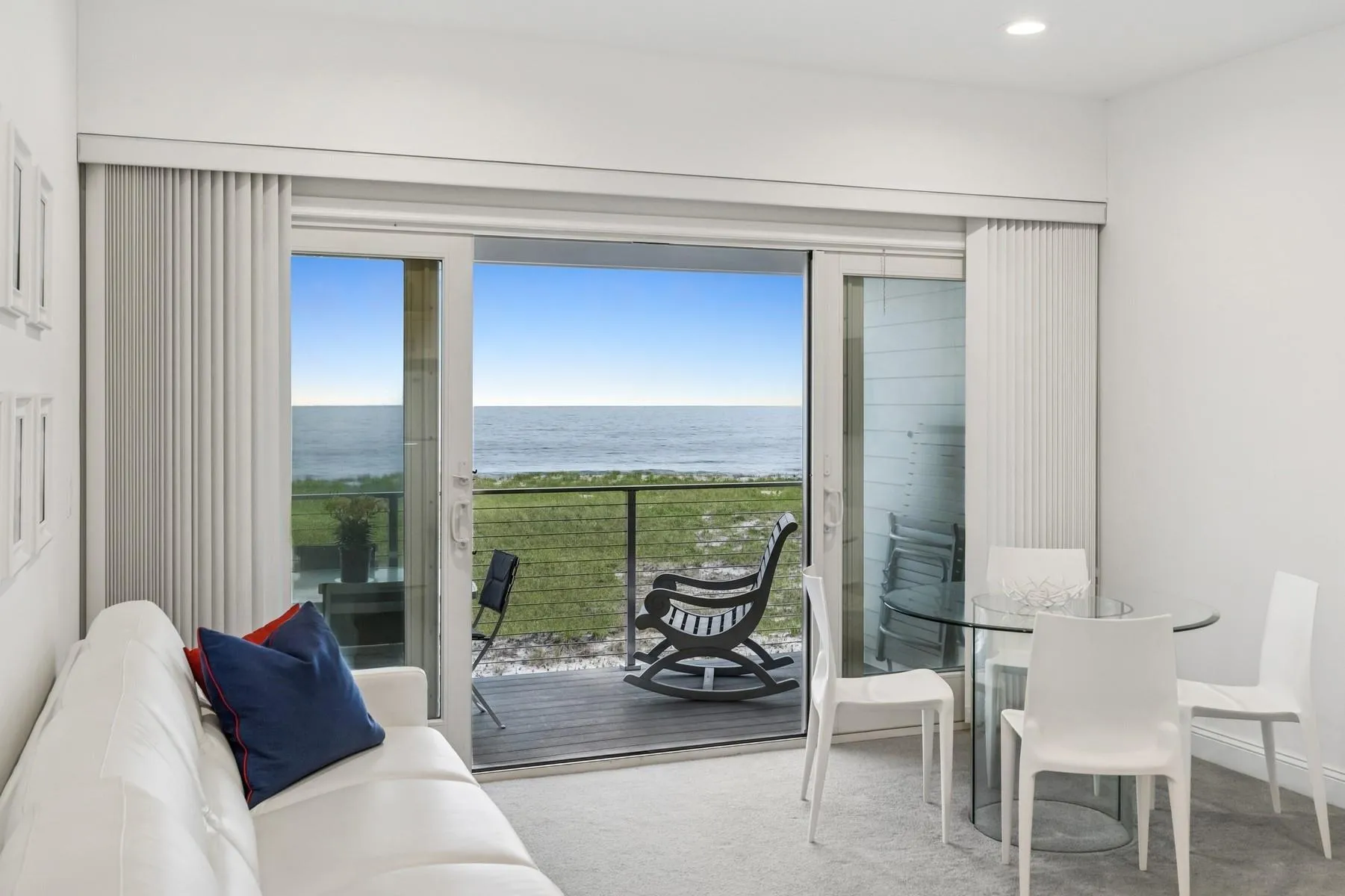 Sliding glass doors lead to private covered beach and ocean view porch. Sliding glass doors lead to private covered beach and ocean view porch.