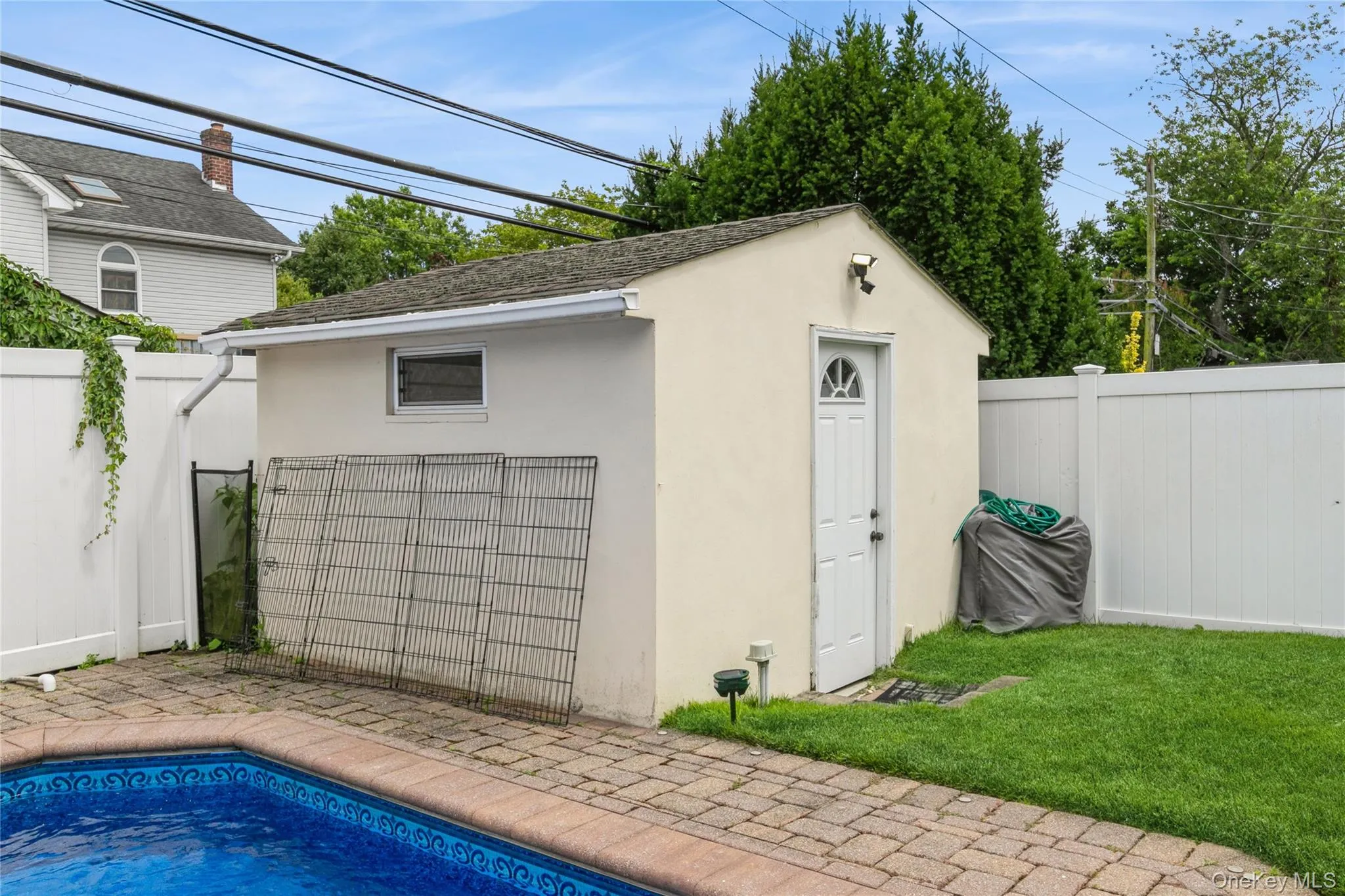 View of outbuilding with a fenced backyard View of outbuilding with a fenced backyard