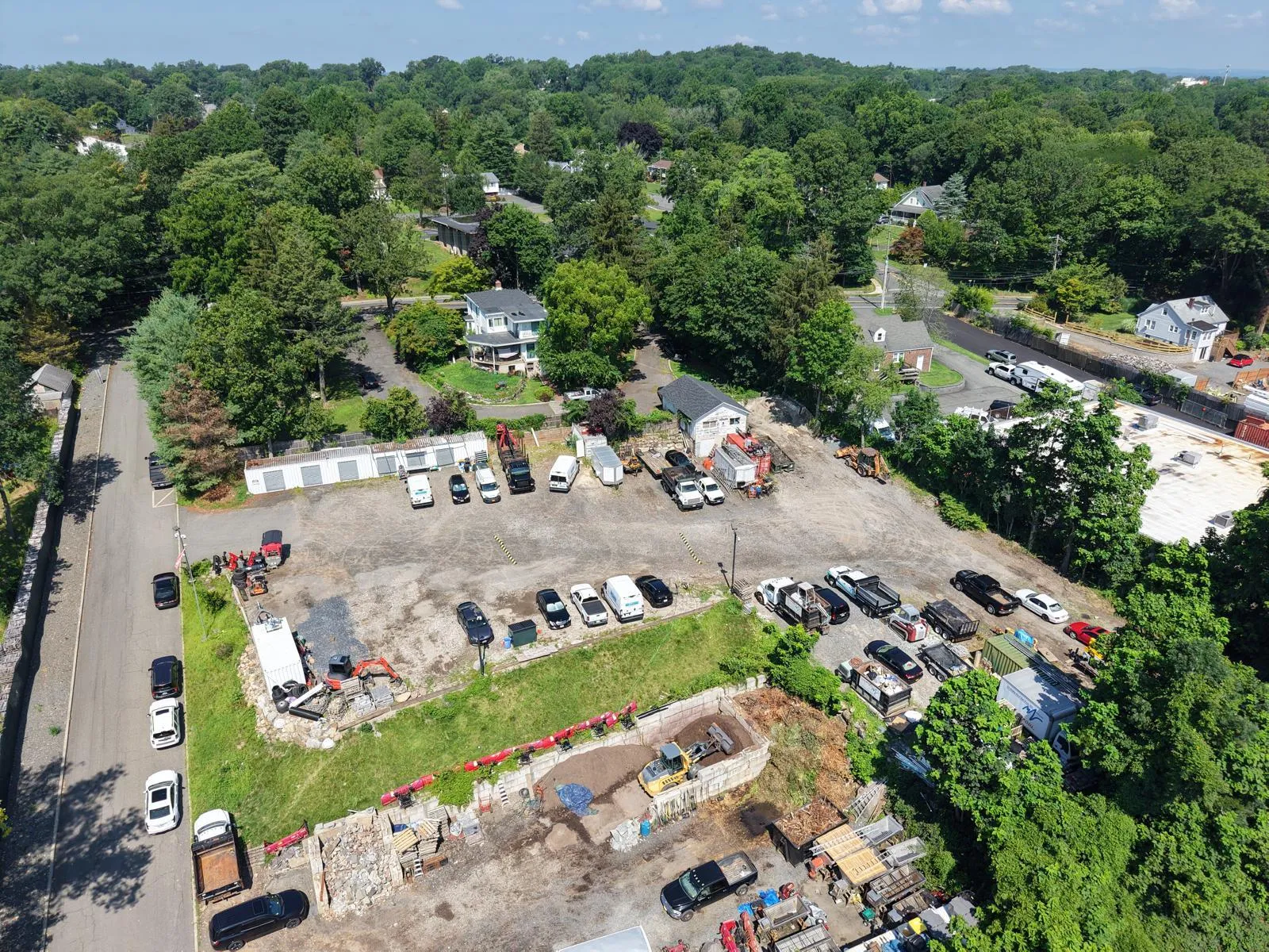 Aerial view of property\'s location with a heavily wooded area Aerial view of property\'s location with a heavily wooded area