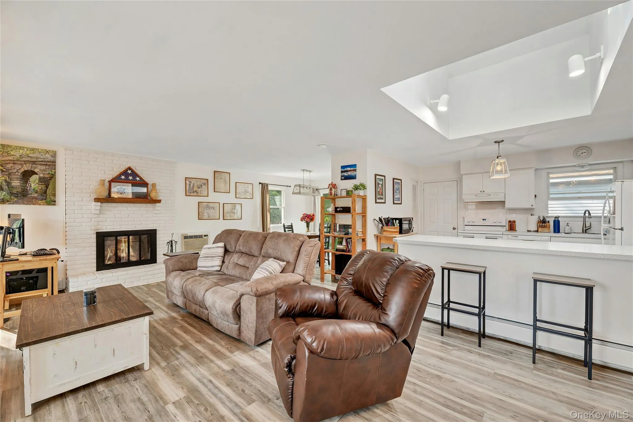 Living Room into the kitchen with huge island. Living Room into the kitchen with huge island.