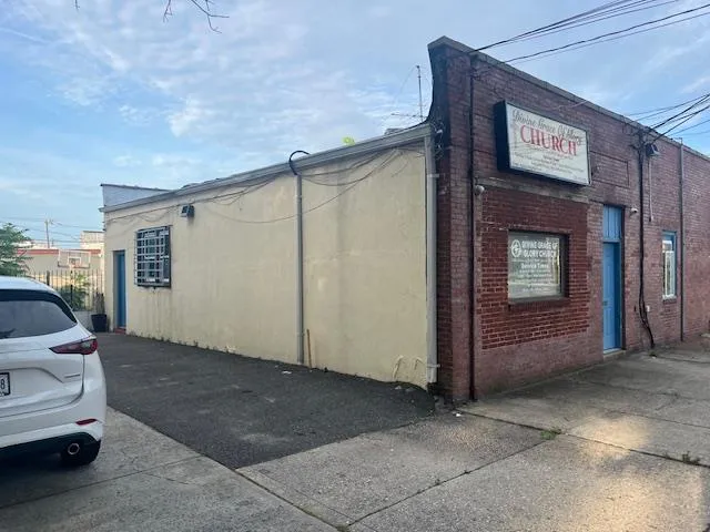 View of side of home with brick siding View of side of home with brick siding