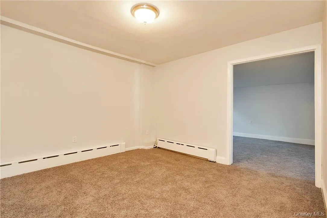 Dining room with new carpeting Dining room with new carpeting