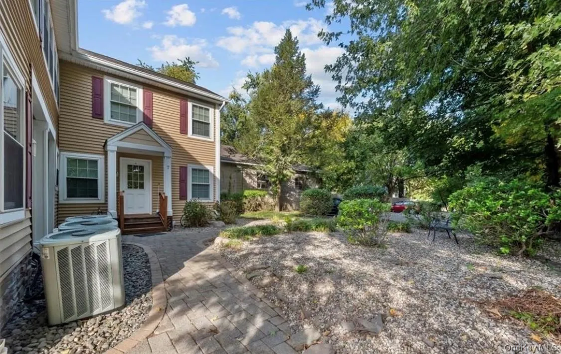 View of front of home with a patio area View of front of home with a patio area