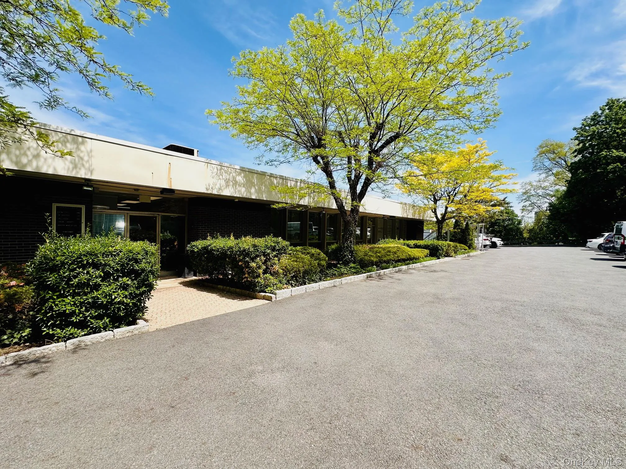 View of street featuring curbs View of street featuring curbs