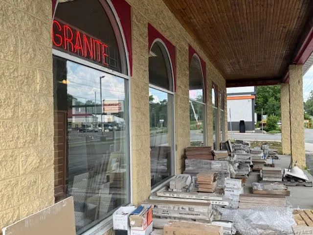 10' overhang in front of the building. 10' overhang in front of the building.