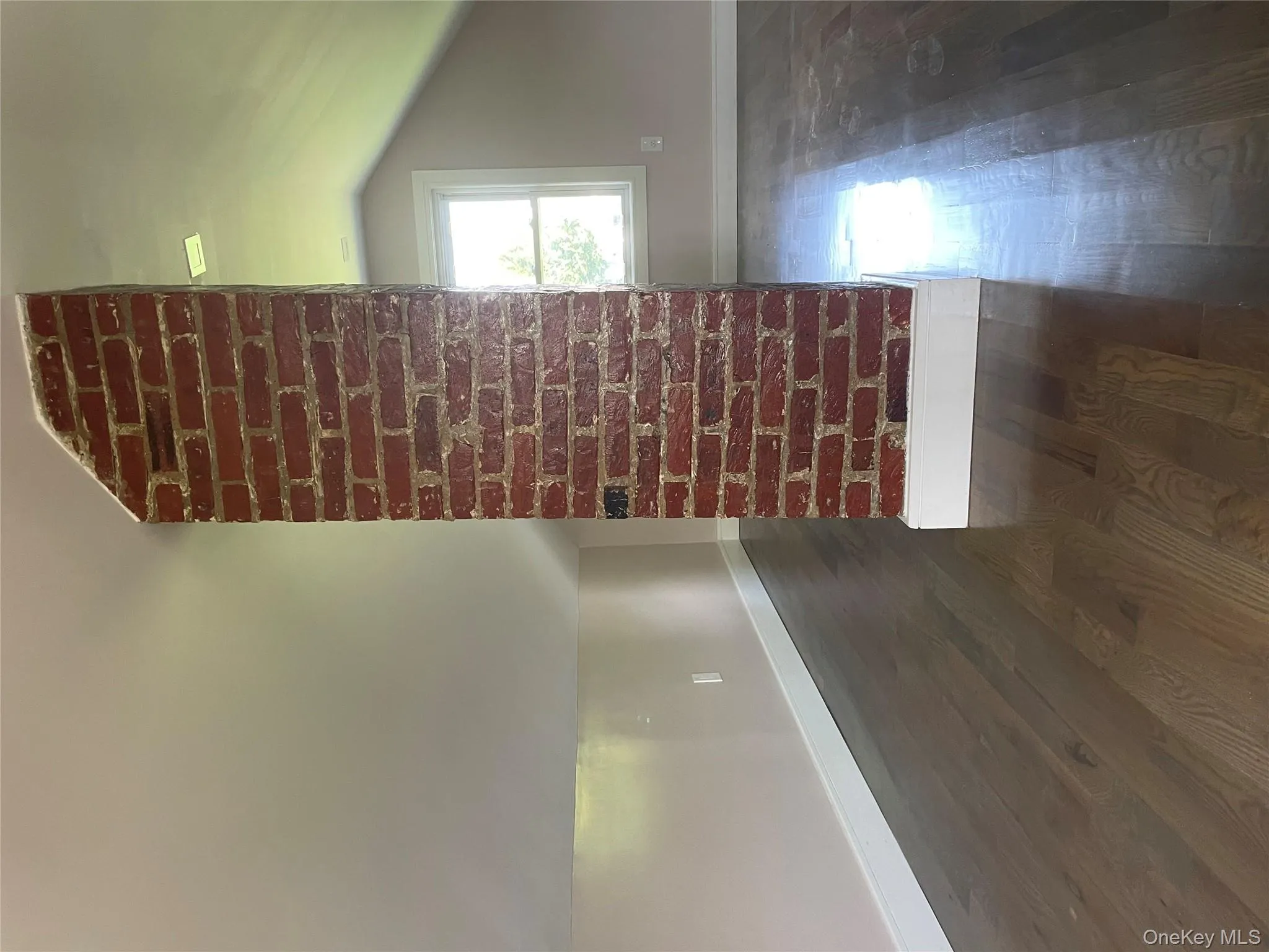 Bonus room featuring vaulted ceiling and dark wood-type flooring Bonus room featuring vaulted ceiling and dark wood-type flooring