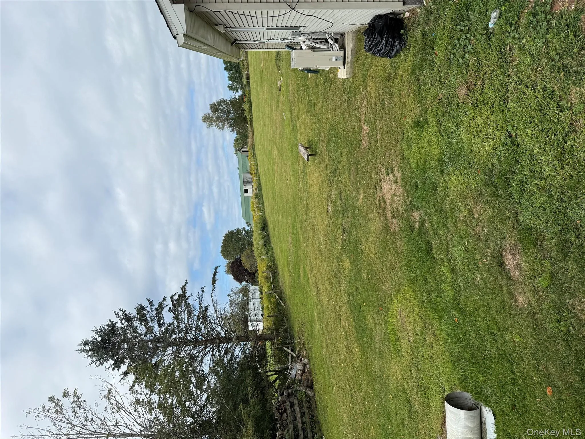 View of green lawn featuring a rural view View of green lawn featuring a rural view