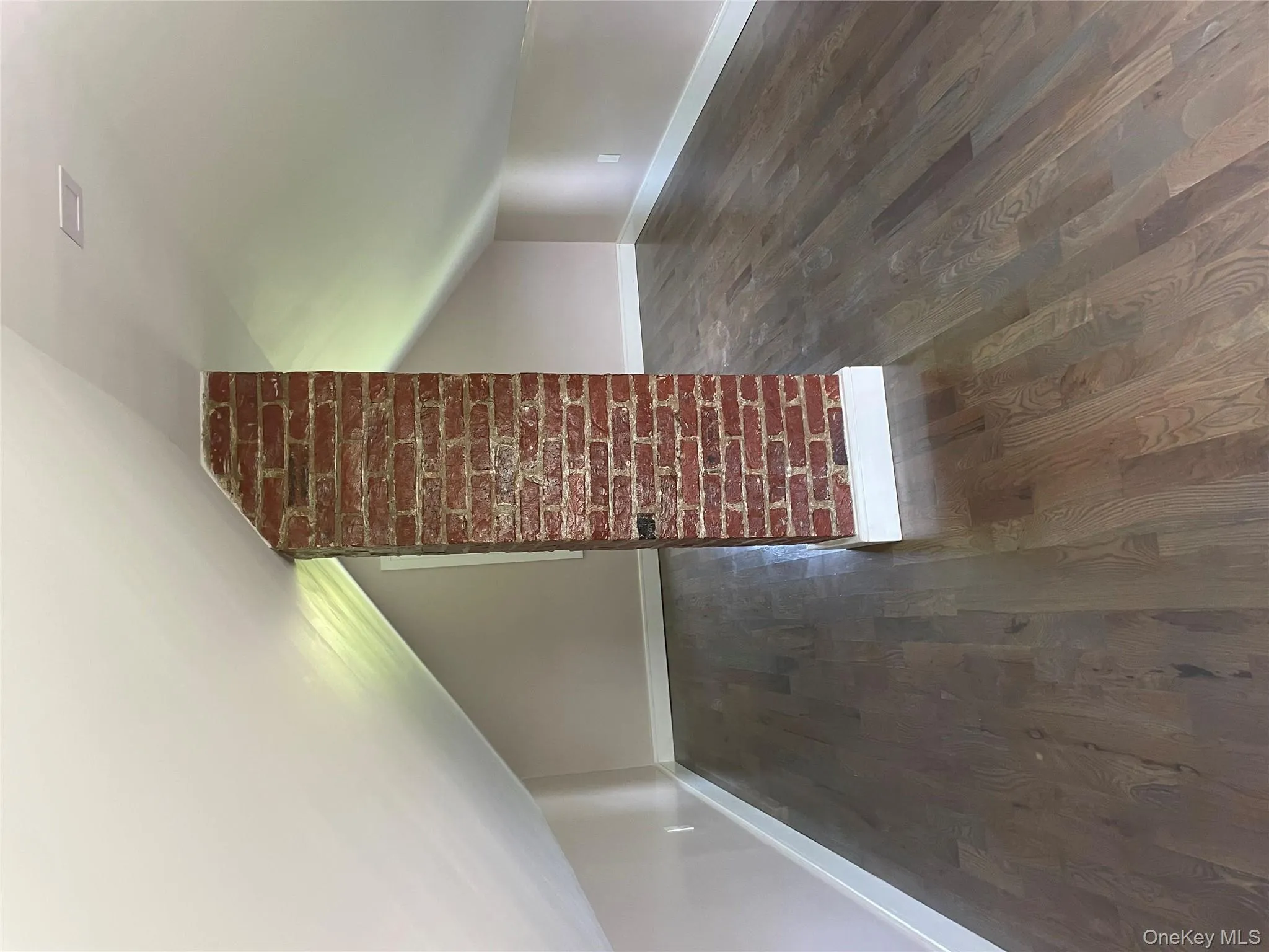 Bonus room featuring dark wood-style flooring and lofted ceiling Bonus room featuring dark wood-style flooring and lofted ceiling