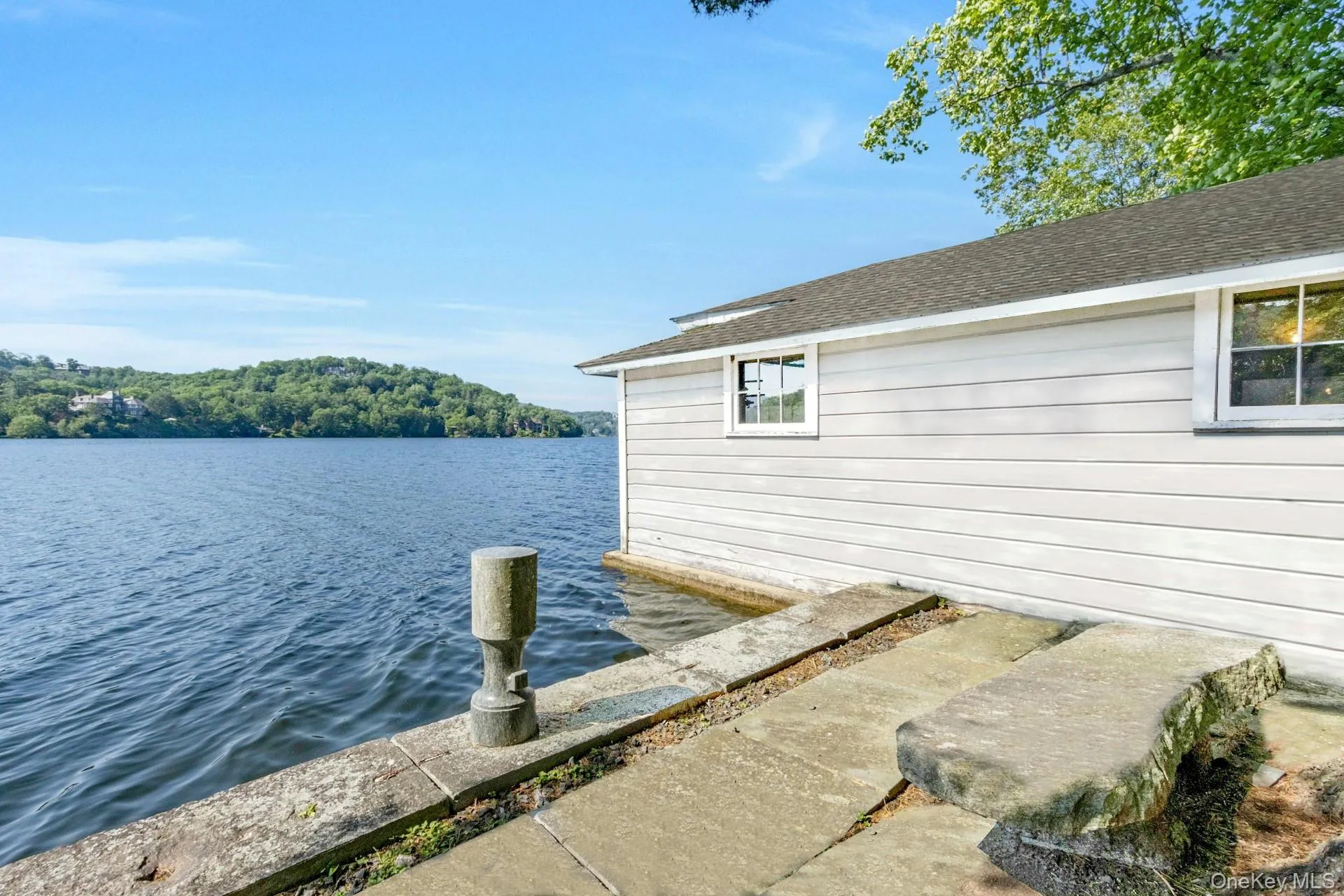 Dock area featuring a water view Dock area featuring a water view