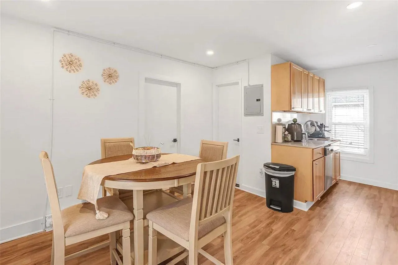 Dining room featuring electric panel, light wood-type flooring, and recessed lighting Dining room featuring electric panel, light wood-type flooring, and recessed lighting