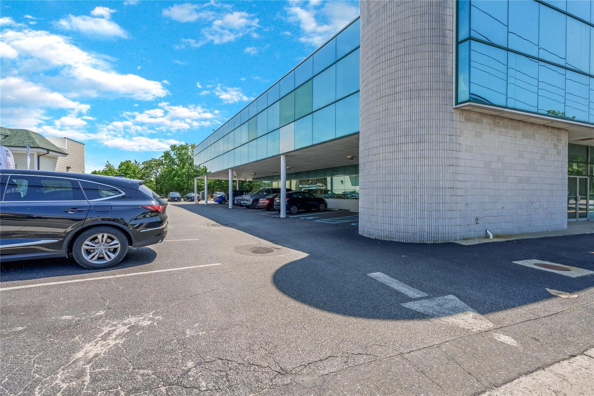 View of partially covered parking lot View of partially covered parking lot