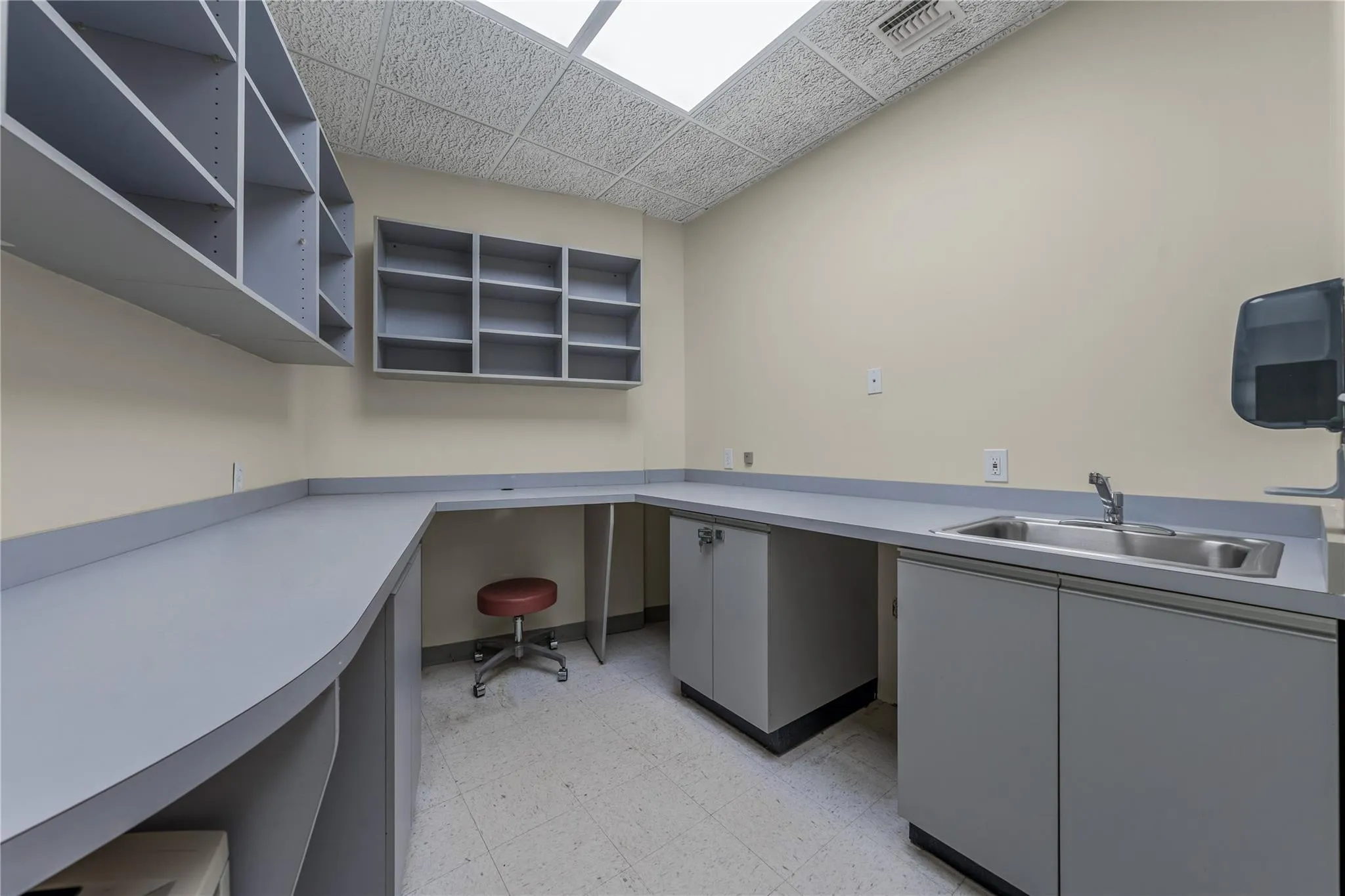 Unfurnished office with light floors and built in study area Unfurnished office with light floors and built in study area