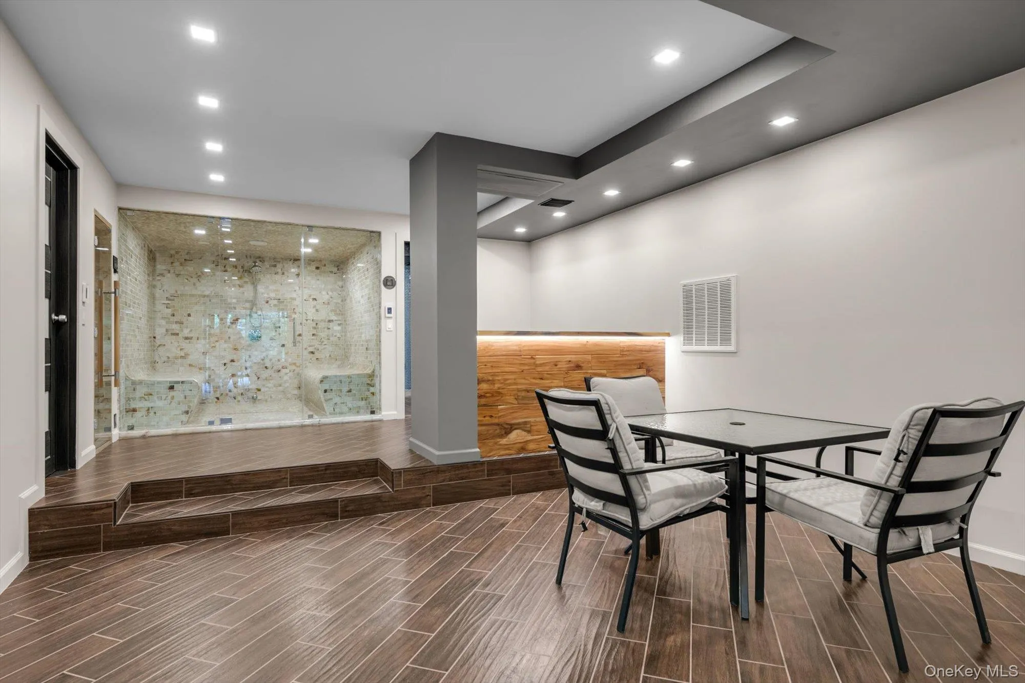 Dining area featuring recessed lighting and wood finish floors Dining area featuring recessed lighting and wood finish floors