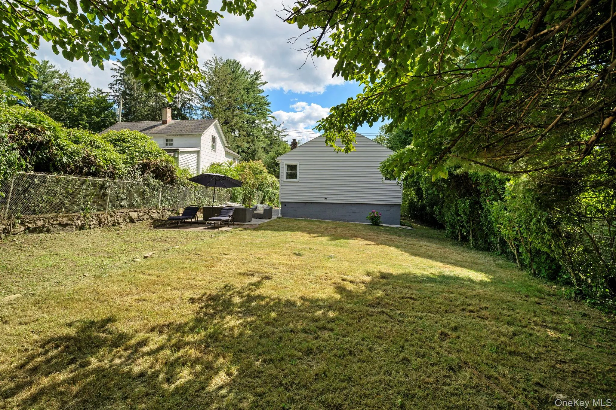 View of yard with an outdoor living space View of yard with an outdoor living space