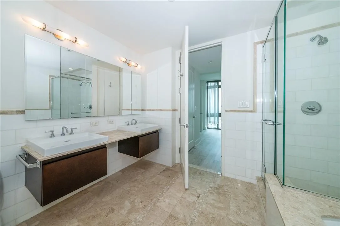Double vanities, separate shower stall Double vanities, separate shower stall