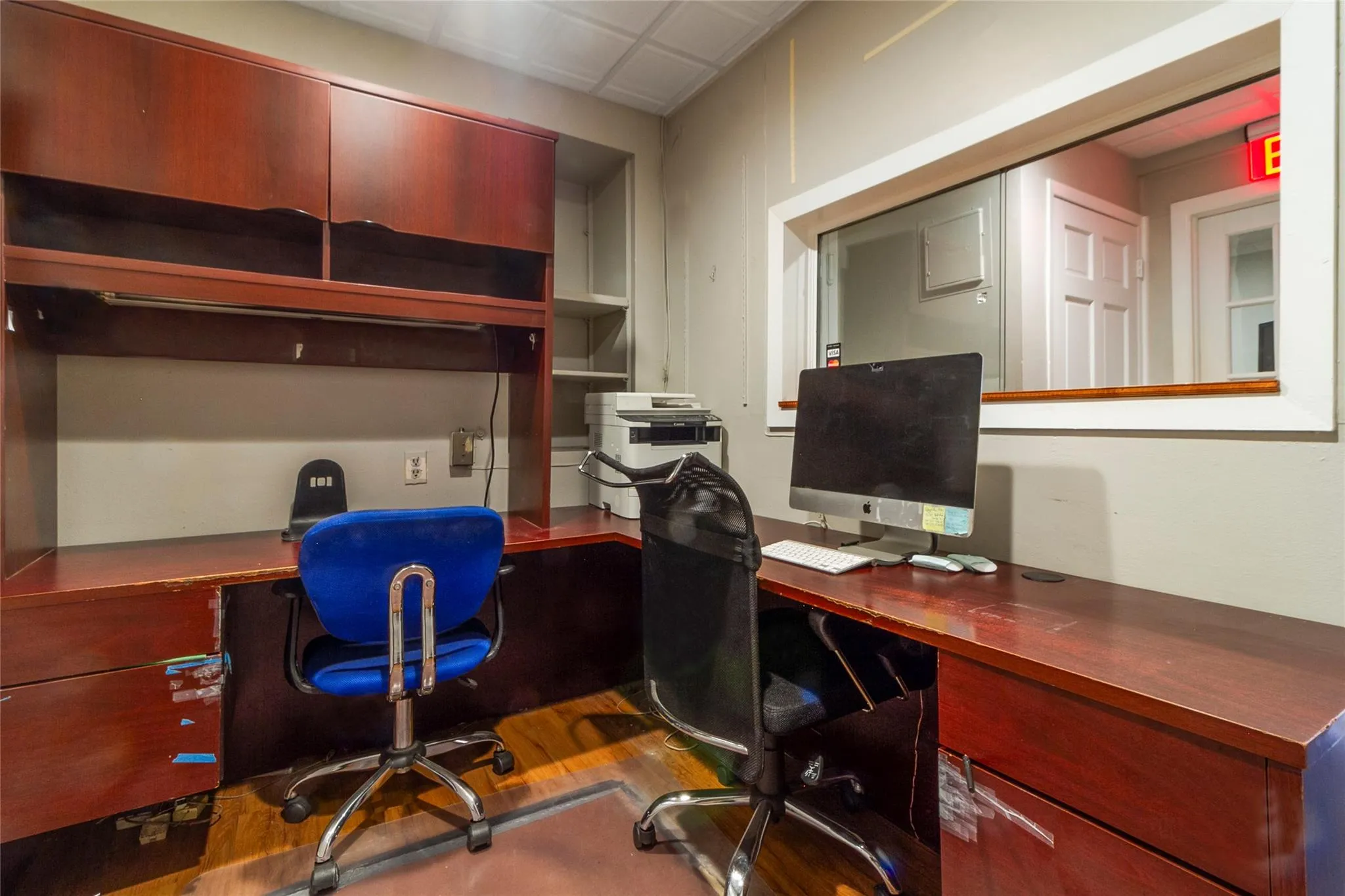 Office space featuring wood finished floors Office space featuring wood finished floors