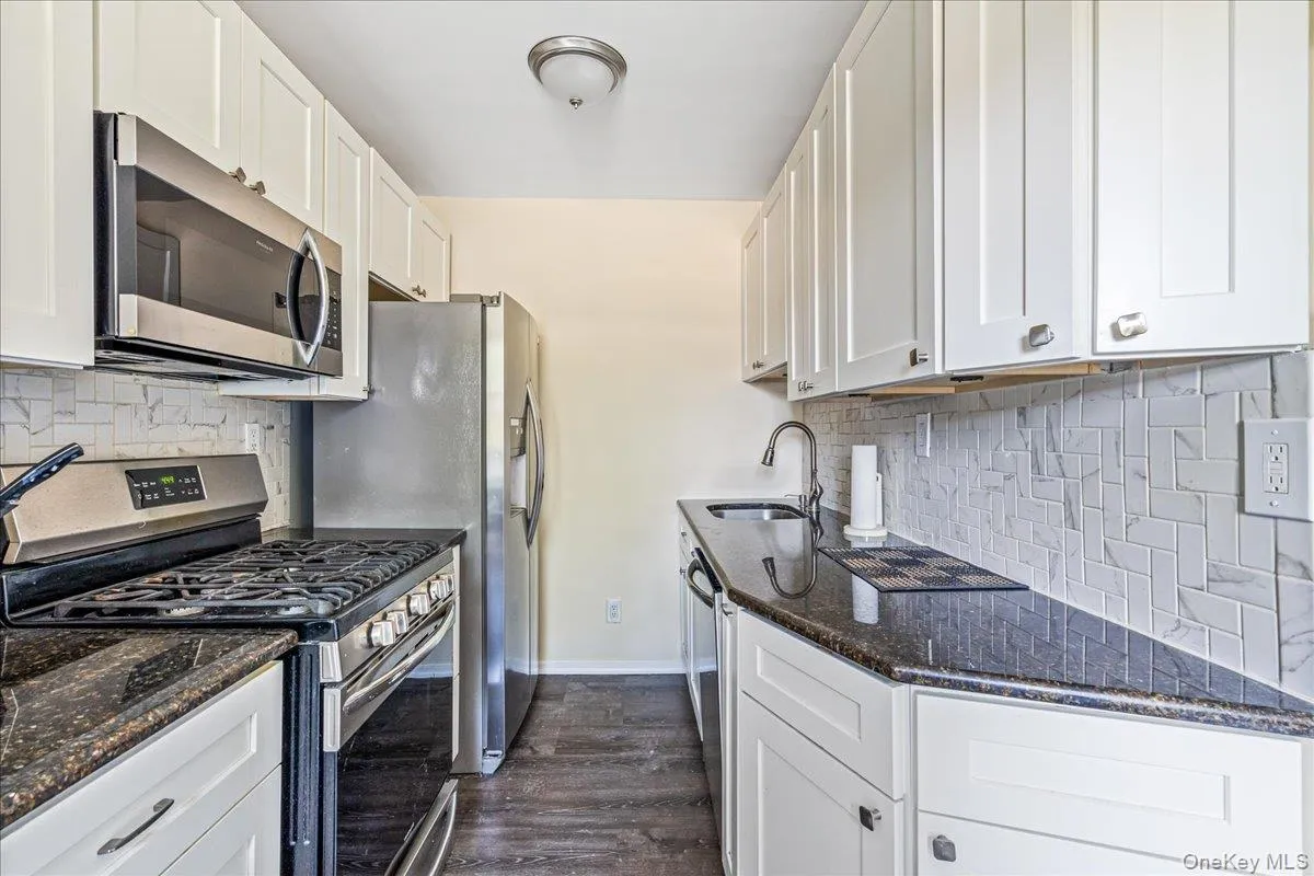 Kitchen with appliances with stainless steel finishes, Kitchen with appliances with stainless steel finishes,