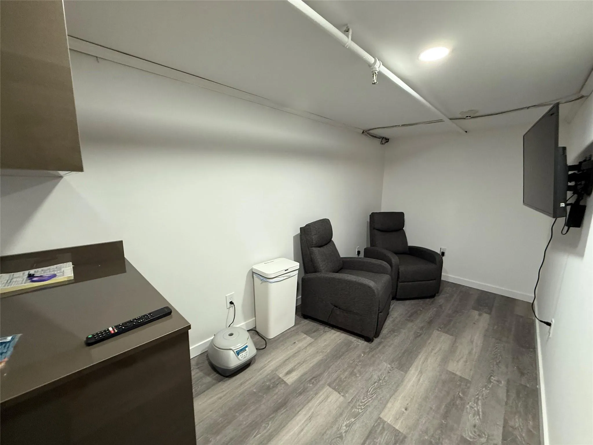Area with wood finished floors and baseboards Area with wood finished floors and baseboards