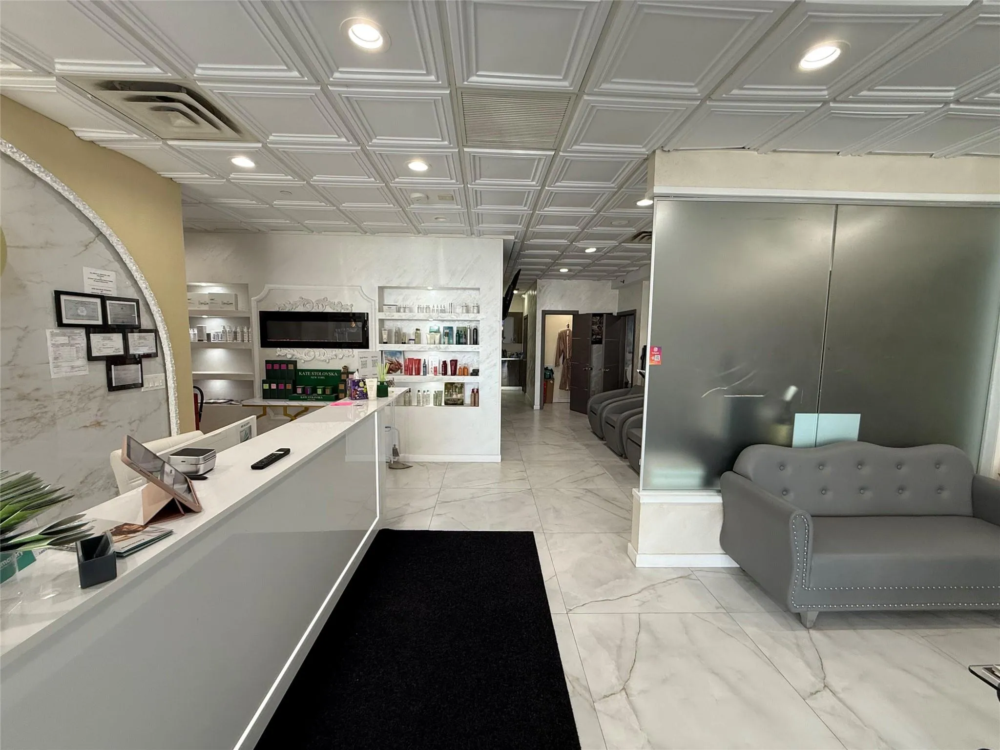 Reception area featuring an ornate ceiling and recessed lighting Reception area featuring an ornate ceiling and recessed lighting