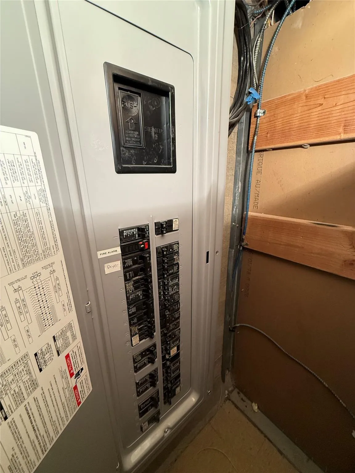 Utility room featuring electric panel Utility room featuring electric panel