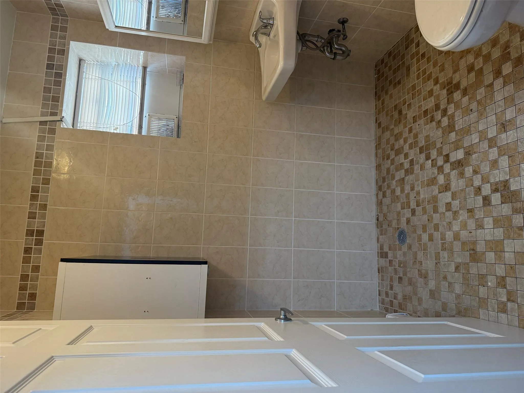 Bathroom with toilet and a sink Bathroom with toilet and a sink