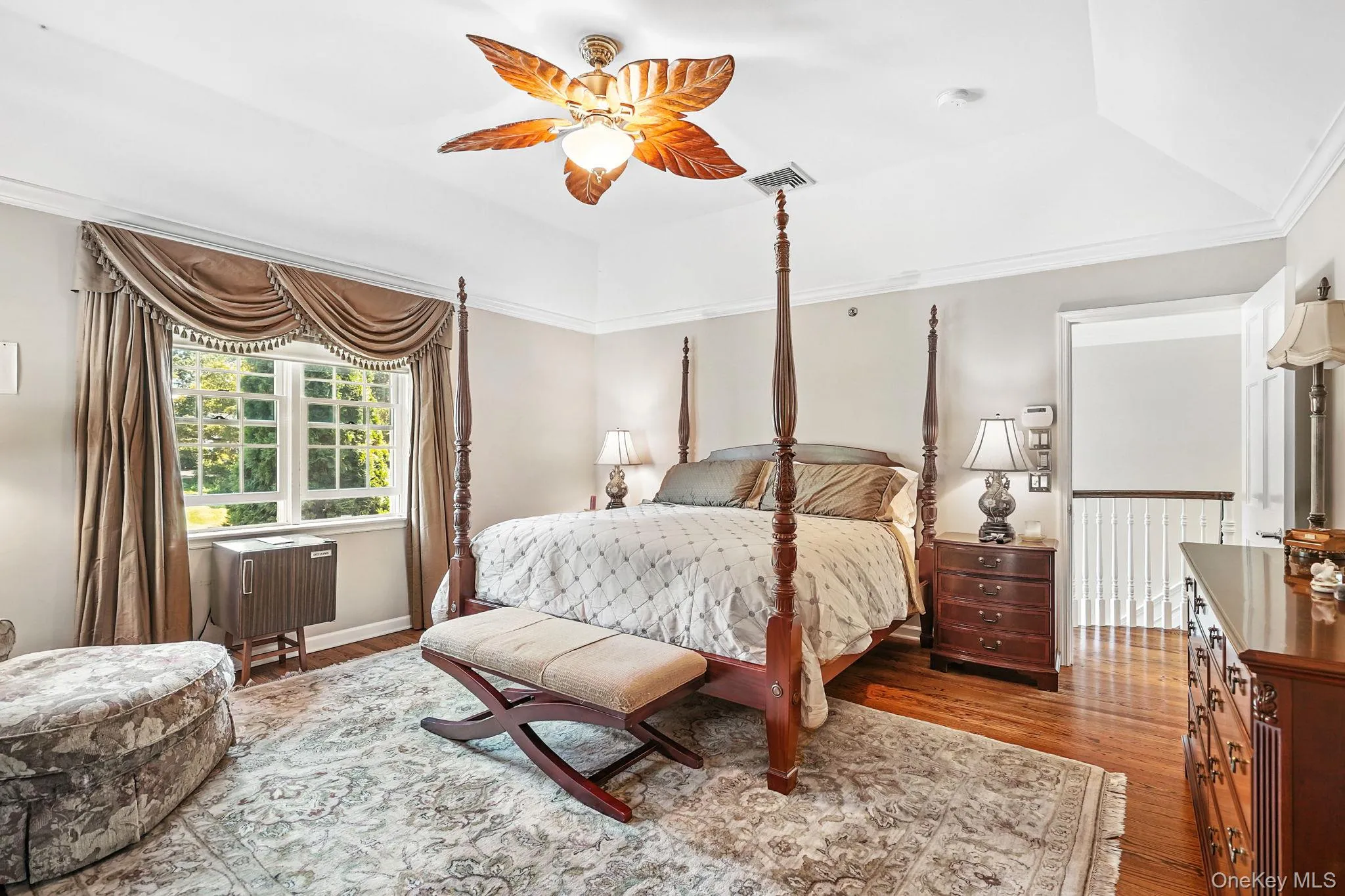 Bedroom featuring raised ceiling, Large walk-in closet and dressing area with attached ensuite double vanity bathroom. Bedroom featuring raised ceiling, Large walk-in closet and dressing area with attached ensuite double vanity bathroom.