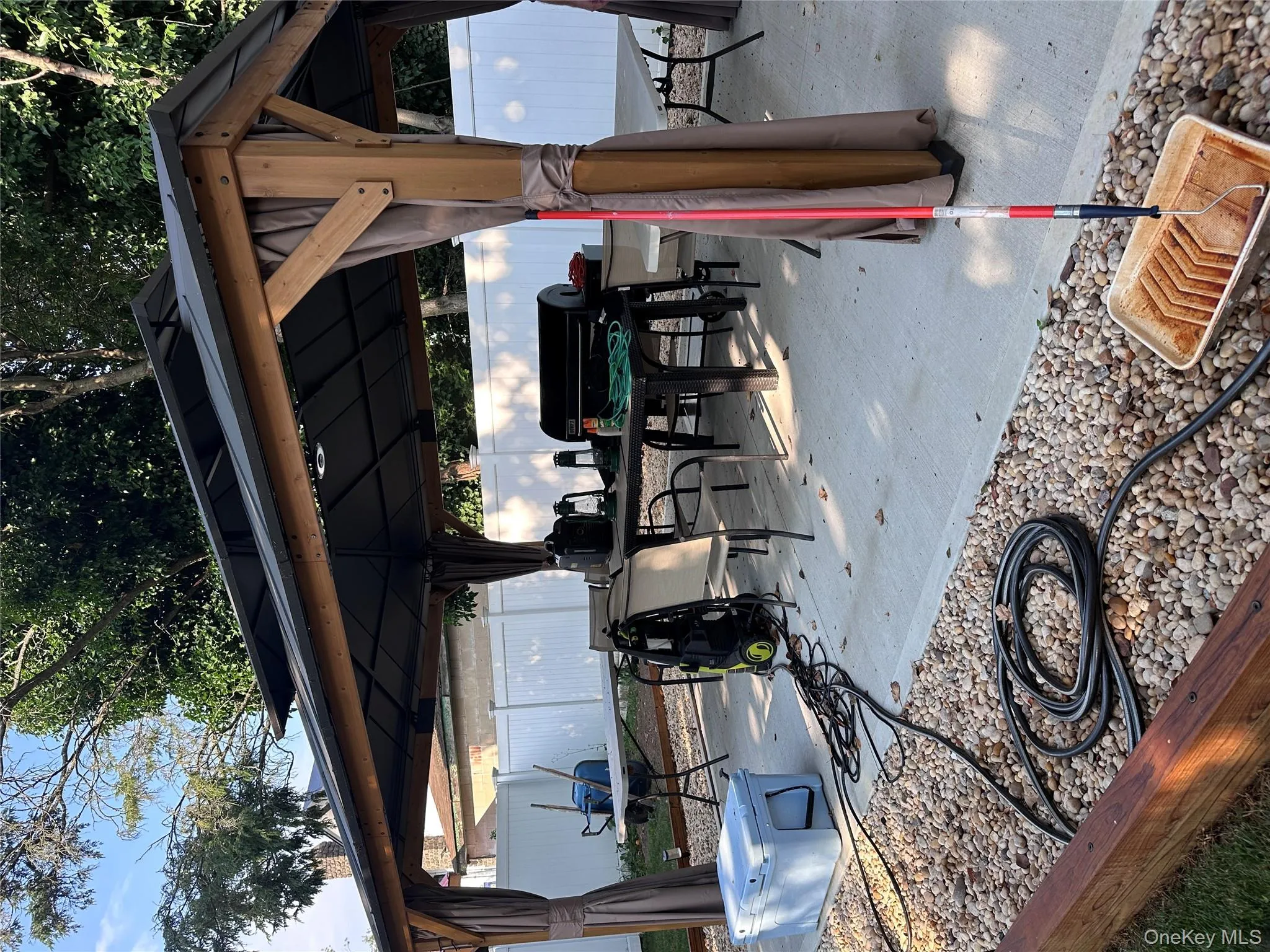 View of patio / terrace with a gazebo View of patio / terrace with a gazebo