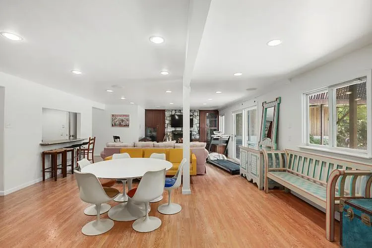 Dining room featuring recessed lighting and light wood-style flooring Dining room featuring recessed lighting and light wood-style flooring