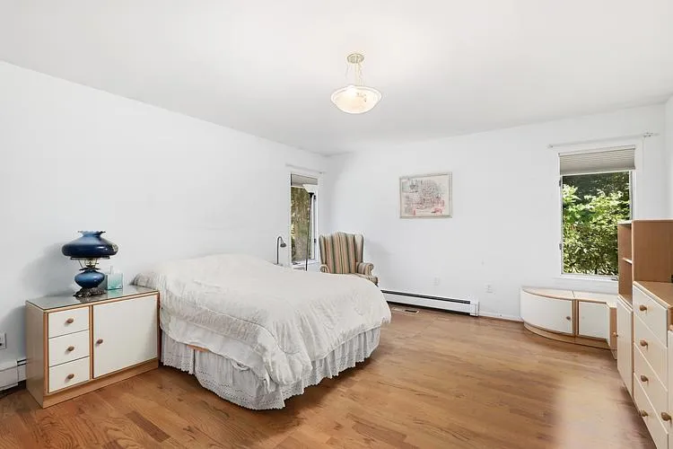 Primary bedroom with walk in closet Primary bedroom with walk in closet