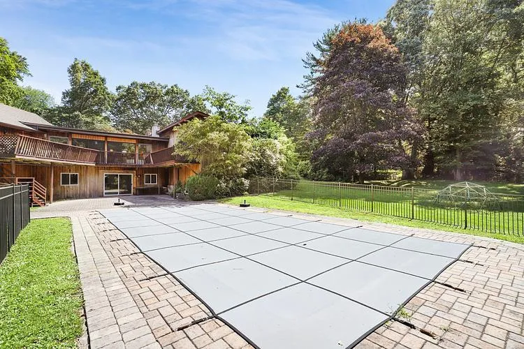View of swimming pool with a patio area View of swimming pool with a patio area
