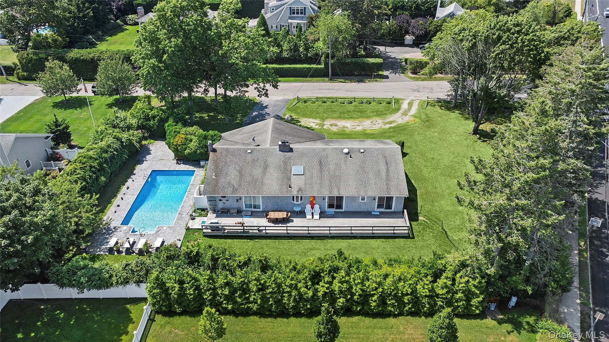 View of subject property featuring a pool area View of subject property featuring a pool area