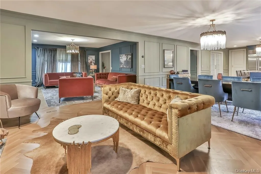 Building lobby with recessed lighting, a decorative wall, and crown molding Building lobby with recessed lighting, a decorative wall, and crown molding