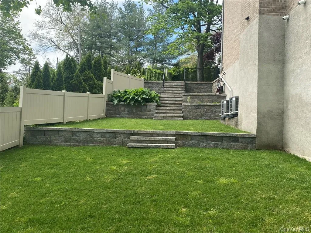 View of yard with stairs View of yard with stairs