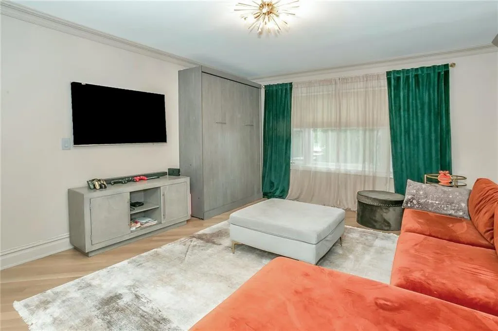 First floor media room/guest bedroom First floor media room/guest bedroom