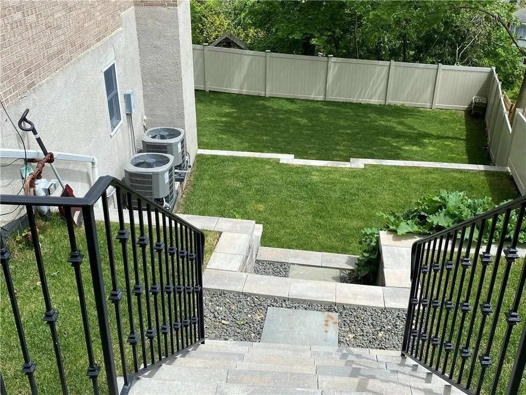 Fenced backyard with a gate Fenced backyard with a gate